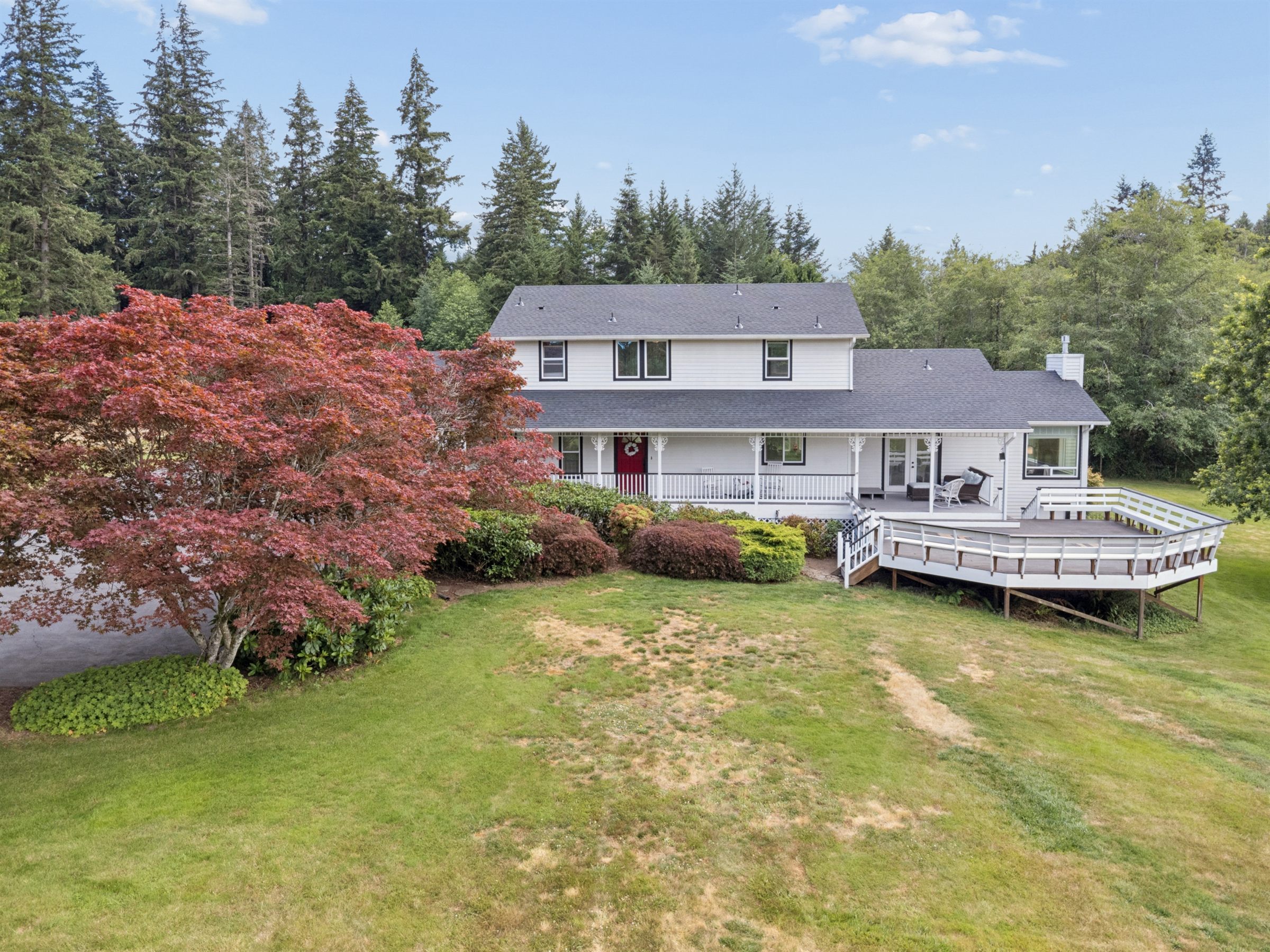 Aerial exterior photo of a residential property