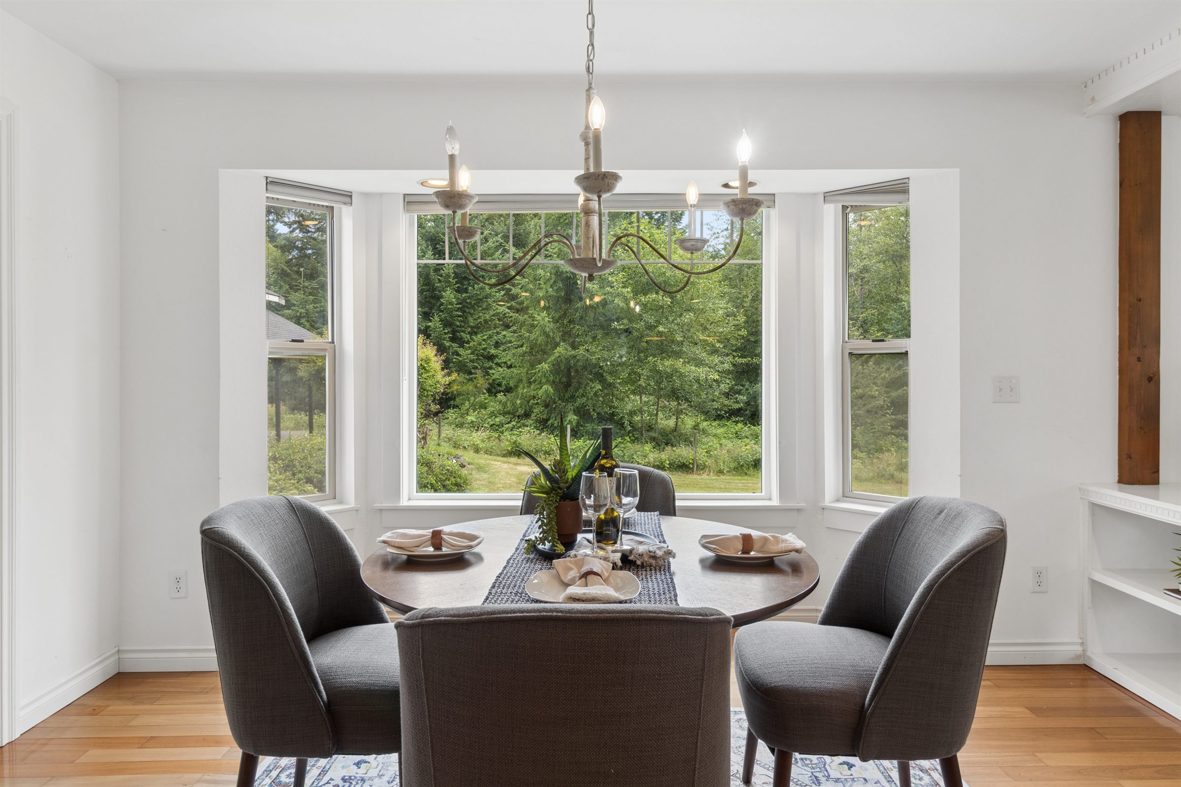 Dining room listing photo with natural light