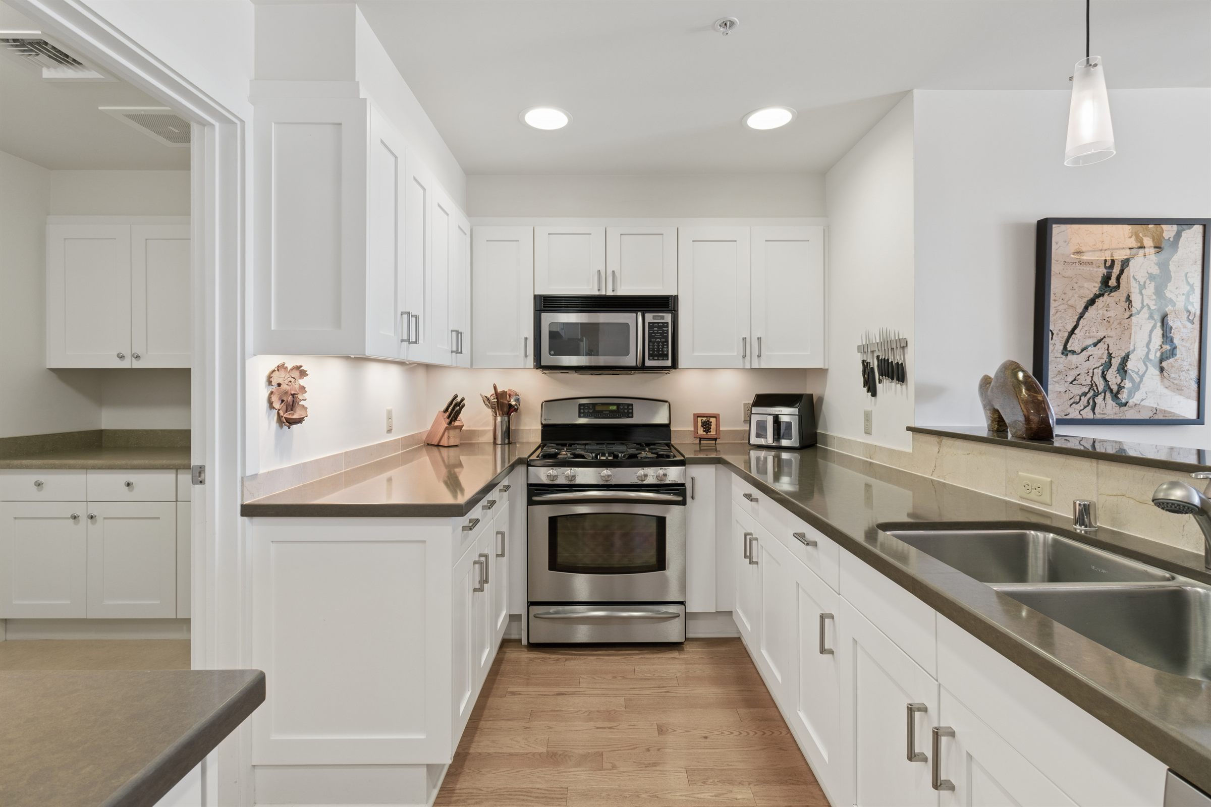 White kitchen photographed for a real estate listing