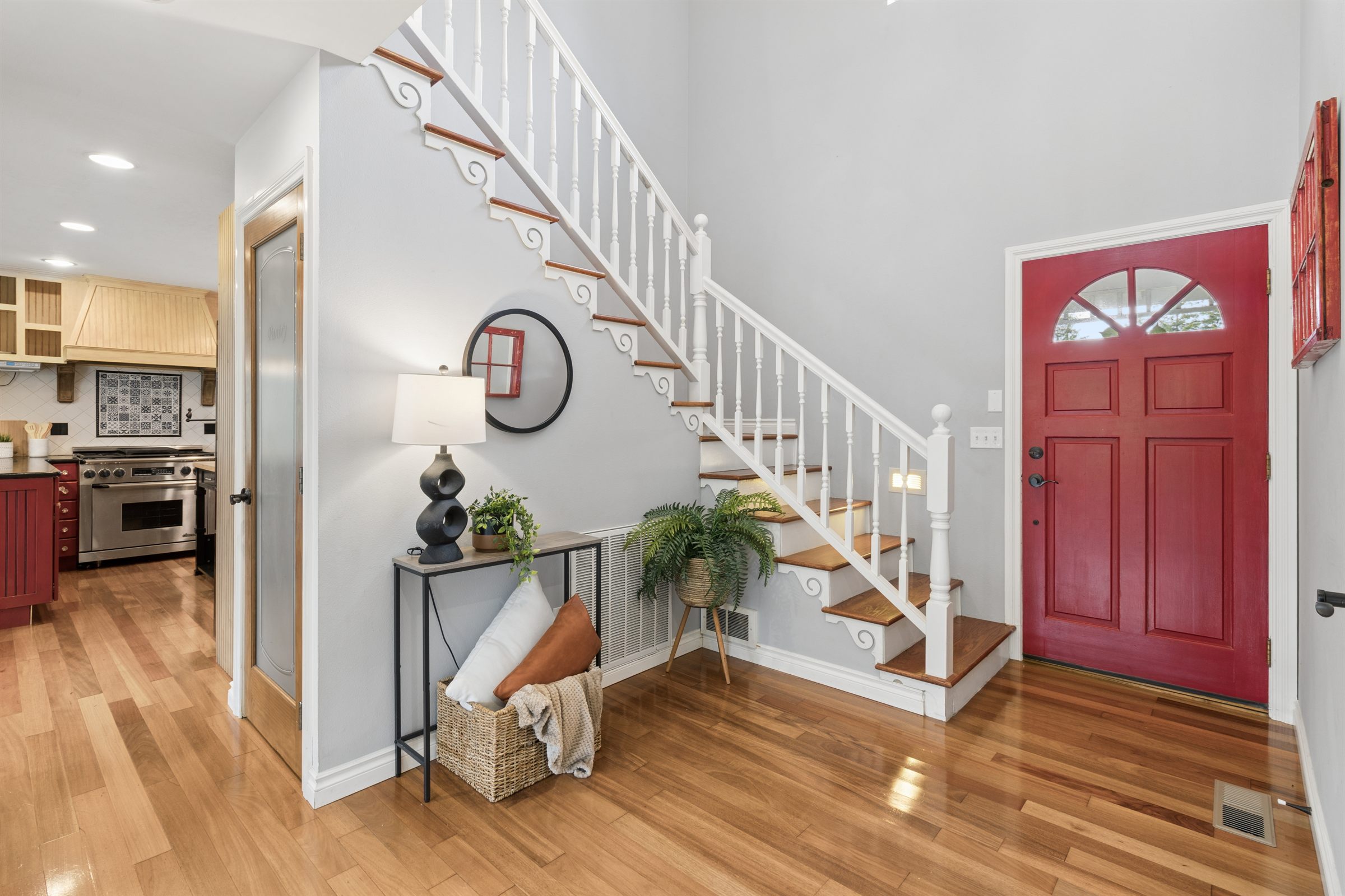 Entry and kitchen flow photographed for listing media