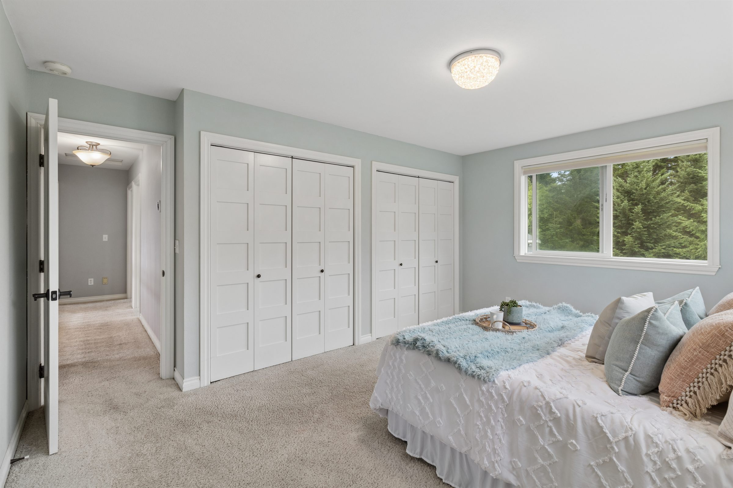 Bedroom listing photo with soft natural light